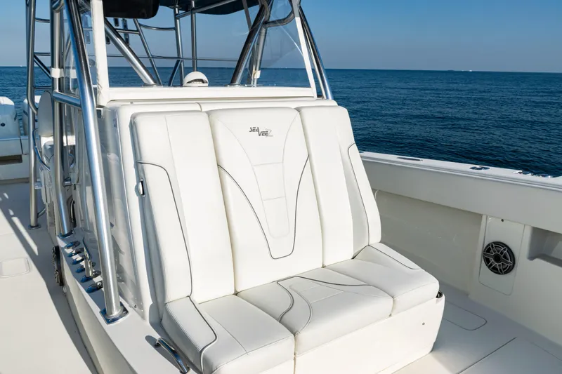  Yacht Photos Pics 2020 SeaVee 390Z boat with white seating, ocean backdrop, and sleek design.