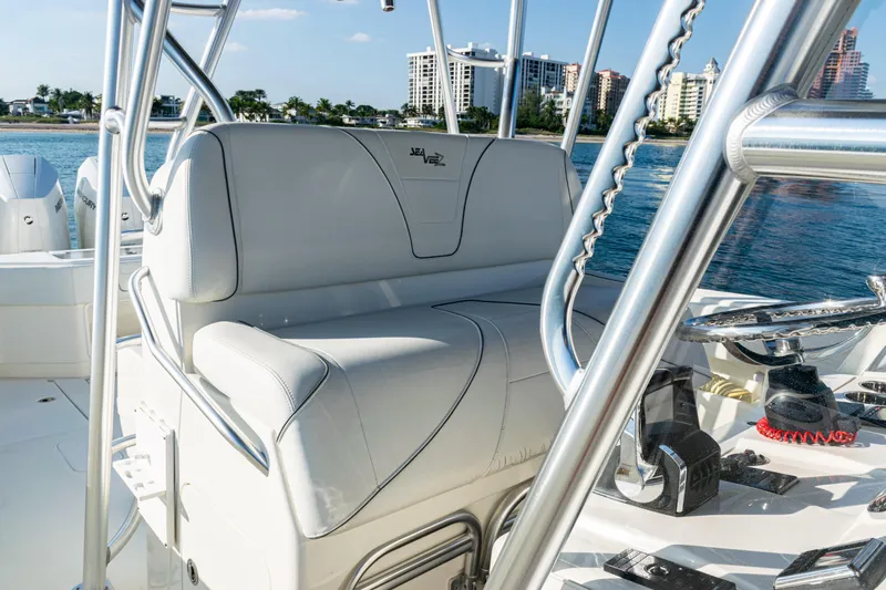  Yacht Photos Pics 2020 SeaVee 390Z boat interior with white seating and stainless steel frame.