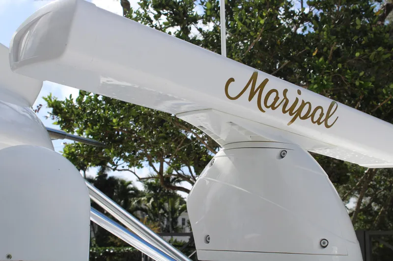 Maripal Yacht Photos Pics Close-up of 2008 Contender 38 Express boat with Maripol name.