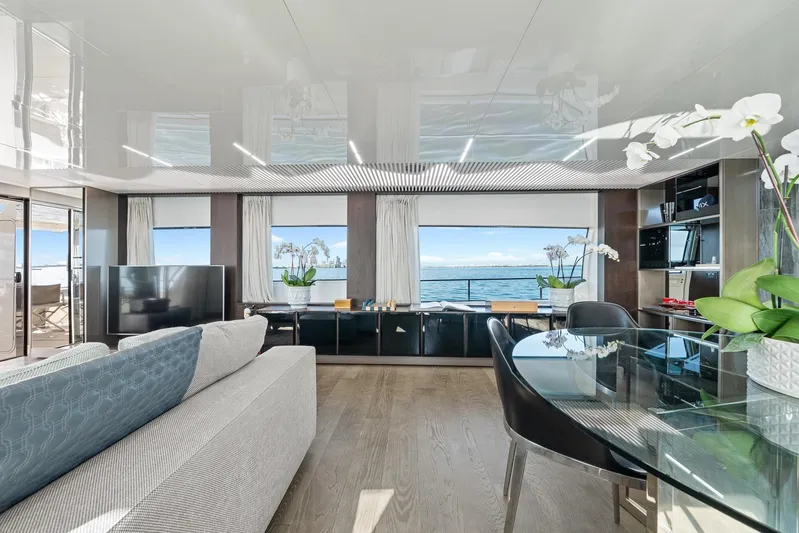Vix Yacht Photos Pics Luxurious interior of 2018 Ferretti Yachts 850 with ocean view, modern decor, and elegant furnishings.