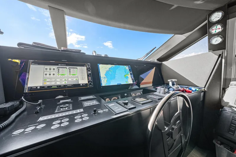 Vix Yacht Photos Pics Cockpit of 2018 Ferretti Yachts 850 with navigation screens and controls.