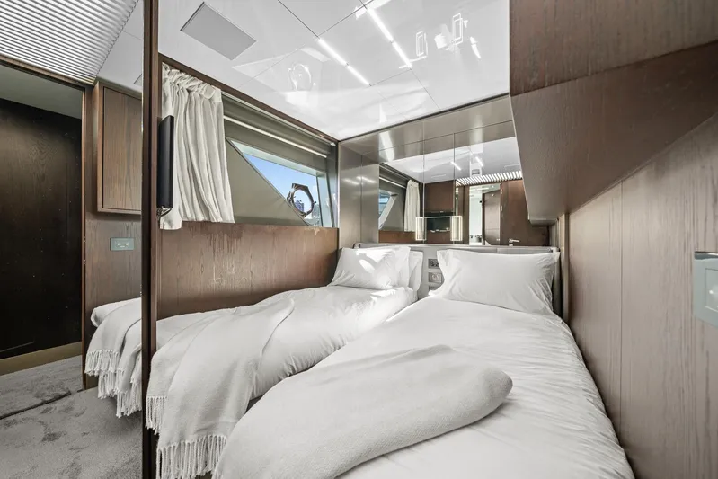 Vix Yacht Photos Pics Luxurious twin bedroom in 2018 Ferretti Yachts 850, featuring modern design and elegant wood finishes.