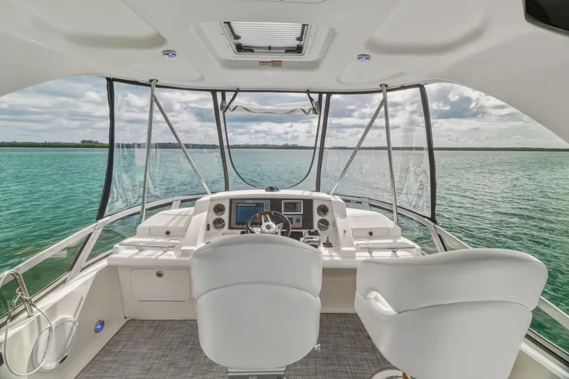 Deep Blue Yacht Photos Pics 2008 Sea Ray 36 Sedan Bridge helm with panoramic ocean view.