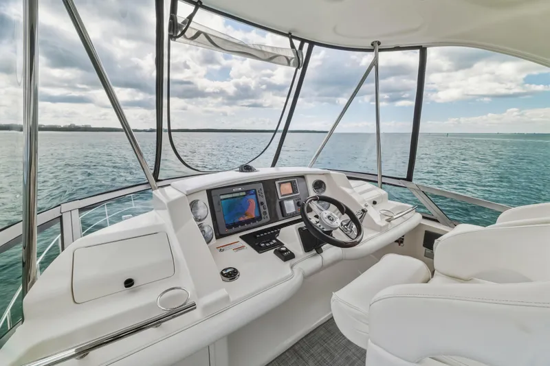 Deep Blue Yacht Photos Pics 2008 Sea Ray 36 Sedan Bridge helm with ocean view, featuring modern navigation equipment.