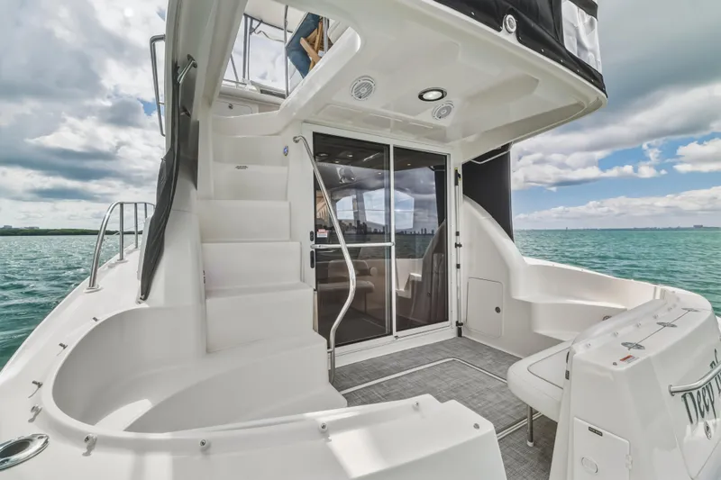 Deep Blue Yacht Photos Pics 2008 Sea Ray 36 Sedan Bridge yacht with spacious deck and ocean view.