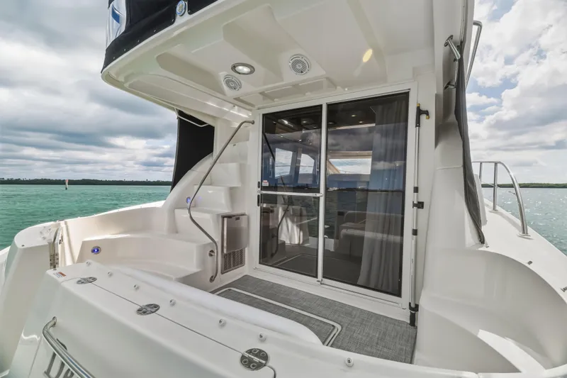 Deep Blue Yacht Photos Pics 2008 Sea Ray 36 Sedan Bridge yacht with spacious deck and sliding glass doors.