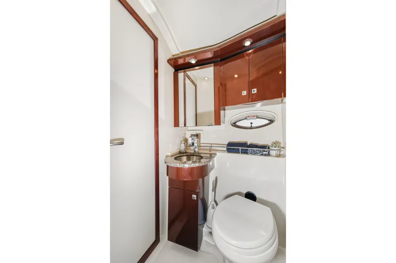 Deep Blue Yacht Photos Pics Luxurious bathroom in 2008 Sea Ray 36 Sedan Bridge yacht with modern fixtures.