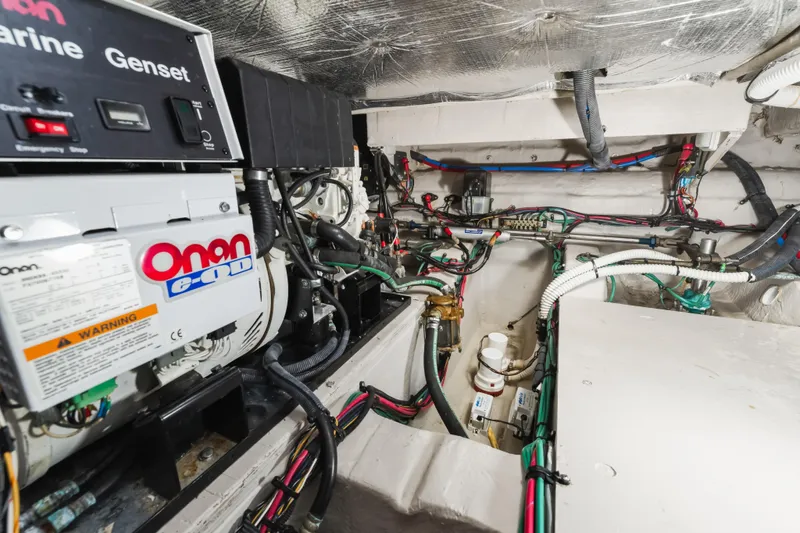 Deep Blue Yacht Photos Pics Engine room of 2008 Sea Ray 36 Sedan Bridge with Onan marine generator.