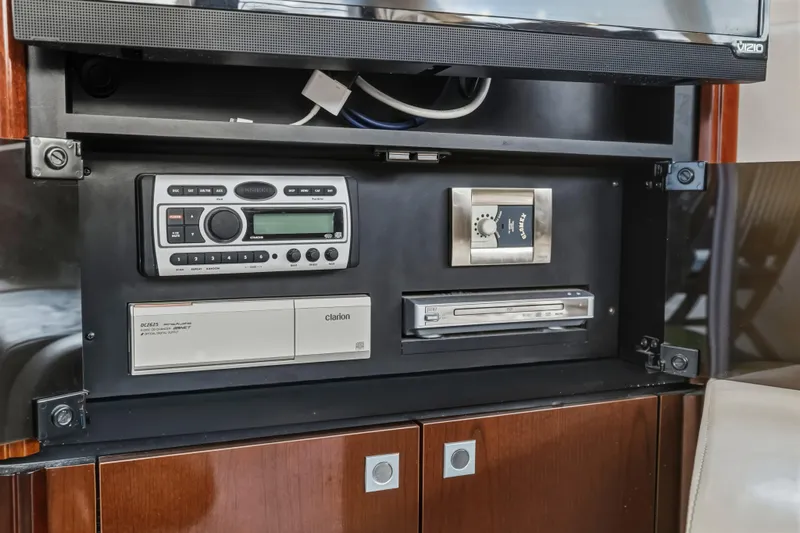 Deep Blue Yacht Photos Pics 2008 Sea Ray 36 Sedan Bridge audio system with Clarion stereo and control panel.