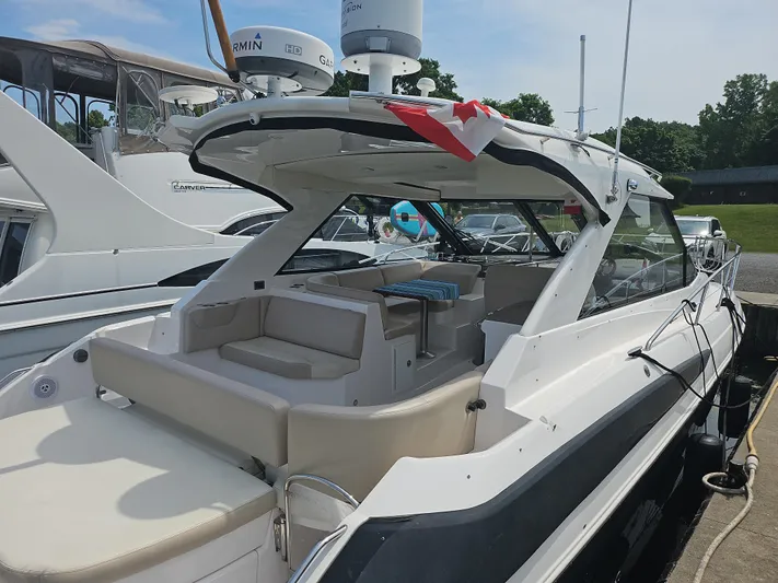  Yacht Photos Pics 2011 Regal 42 Sport Coupe yacht docked, featuring spacious seating and modern design.