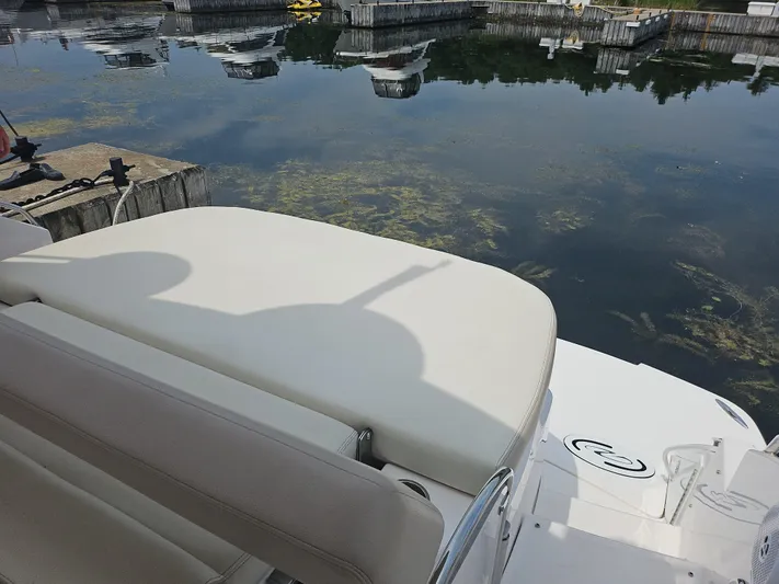  Yacht Photos Pics 2011 Regal 42 Sport Coupe boat docked by calm waters.