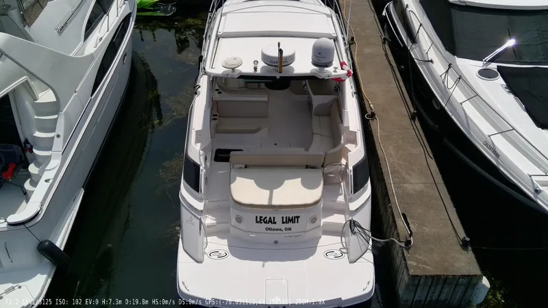  Yacht Photos Pics 2011 Regal 42 Sport Coupe docked, aerial view, with "Legal Limit" on the stern.