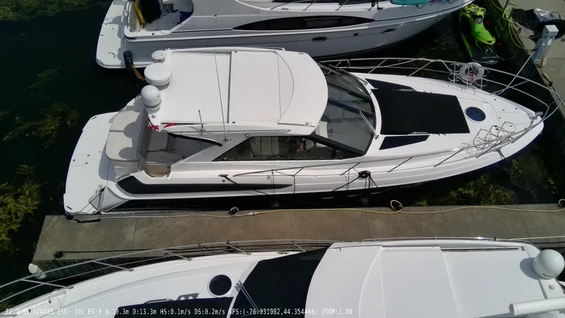  Yacht Photos Pics 2011 Regal 42 Sport Coupe yacht docked at marina, aerial view.