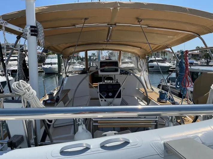 Sapphire Yacht Photos Pics Tartan 4700 sailboat cockpit with canopy, docked at marina, 2014 model.