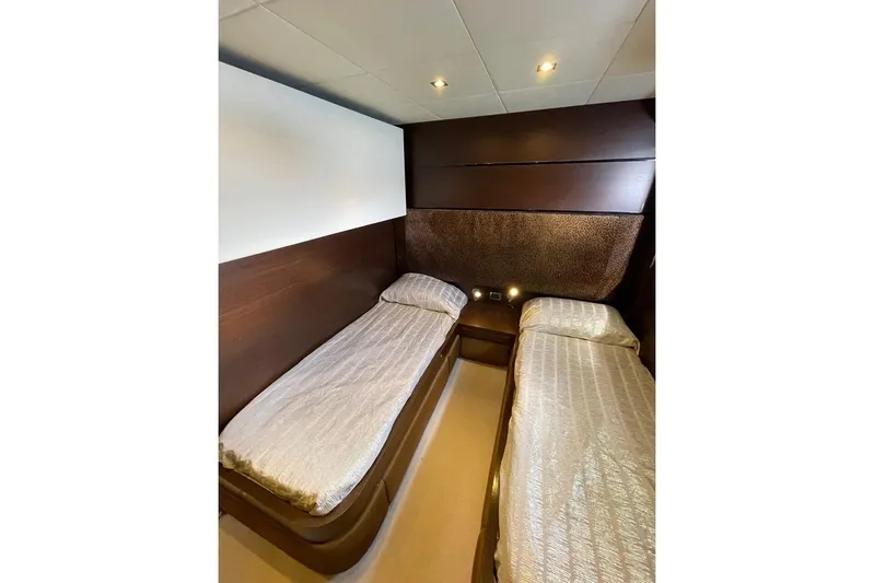 Andea Yacht Photos Pics Luxurious twin cabin in 2008 Tecnomar Nadara 26 Fly yacht, featuring elegant wood paneling.