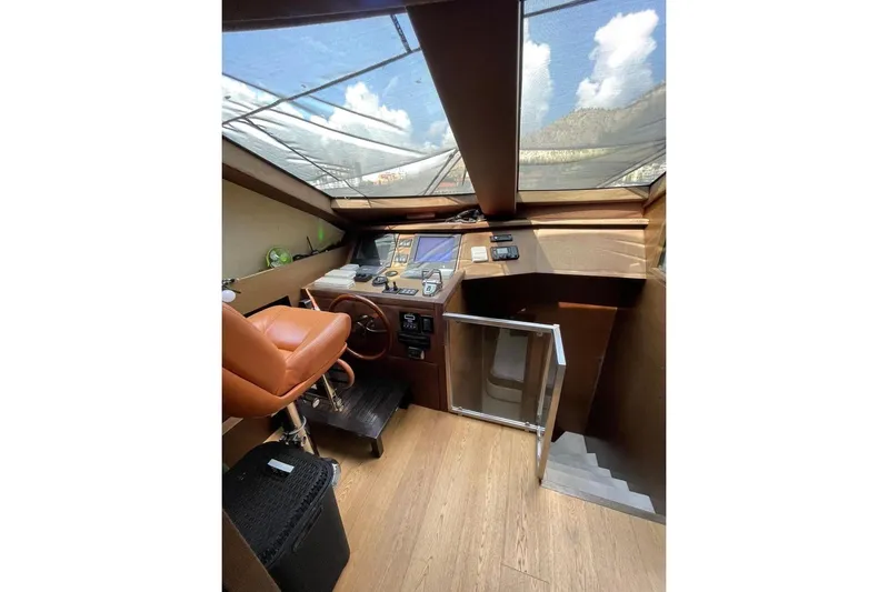 Andea Yacht Photos Pics Helm of 2008 Tecnomar Nadara 26 Fly yacht with leather seat and panoramic windows.