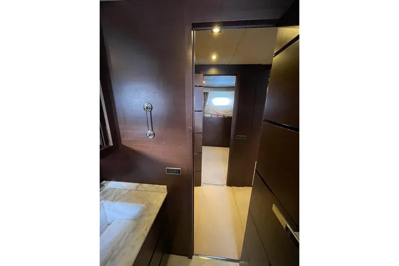 Andea Yacht Photos Pics Luxurious interior of 2008 Tecnomar Nadara 26 Fly yacht with elegant wood finishes.