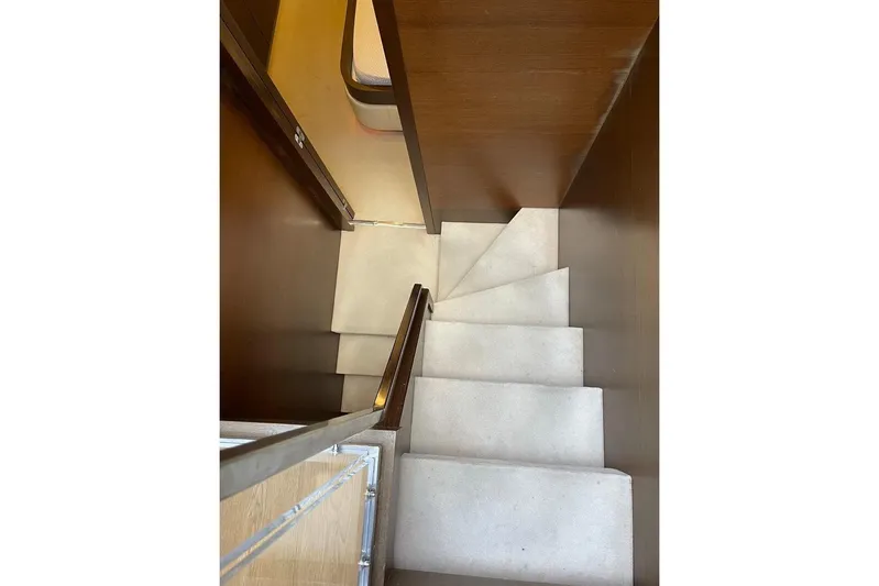 Andea Yacht Photos Pics Staircase inside 2008 Tecnomar Nadara 26 Fly yacht, featuring wooden walls and light steps.