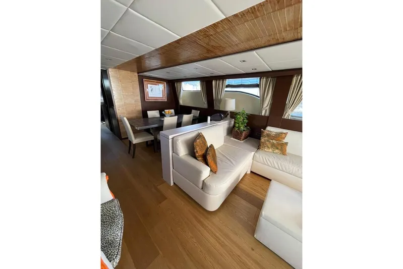 Andea Yacht Photos Pics Luxurious interior of 2008 Tecnomar Nadara 26 Fly yacht with elegant seating and dining area.