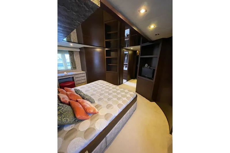 Andea Yacht Photos Pics Luxurious bedroom interior of 2008 Tecnomar Nadara 26 Fly yacht with modern design elements.