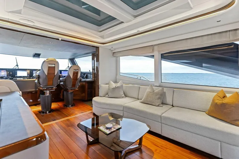 Amarula Sun Yacht Photos Pics Luxurious interior of 2024 Princess X80 yacht with modern seating and ocean view.
