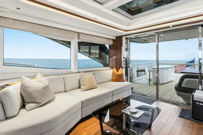 Amarula Sun Yacht Photos Pics Luxurious 2024 Princess X80 yacht interior with ocean view and elegant seating area.