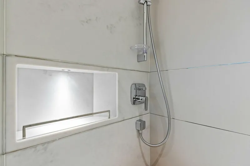 Amarula Sun Yacht Photos Pics Modern shower with chrome fixtures in 2024 Princess X80 yacht bathroom.