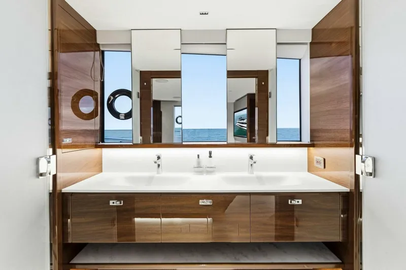 Amarula Sun Yacht Photos Pics Luxurious bathroom on 2024 Princess X80 yacht with ocean view and modern fixtures.