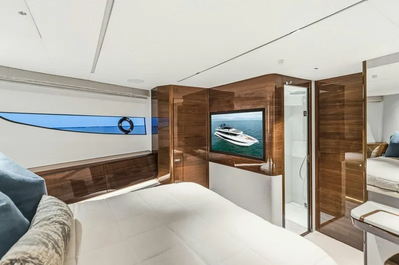 Amarula Sun Yacht Photos Pics Luxurious 2024 Princess X80 yacht interior with elegant wood finishes and modern amenities.