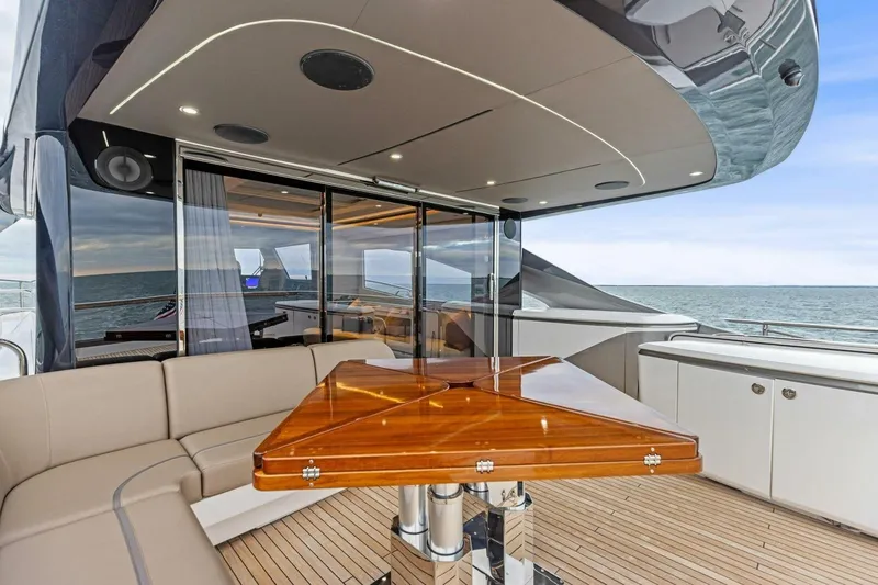 Amarula Sun Yacht Photos Pics Luxurious 2024 Princess X80 yacht deck with elegant seating and ocean view.