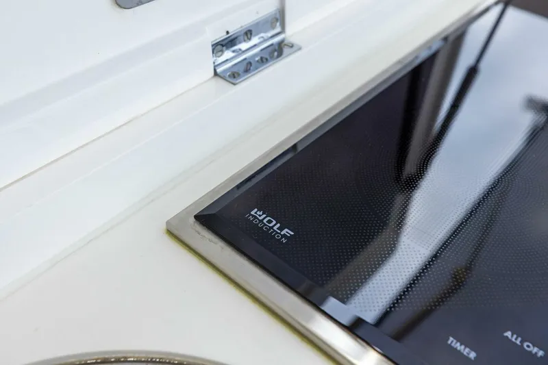 Amarula Sun Yacht Photos Pics Modern Wolf induction cooktop on 2024 Princess X80 yacht kitchen.