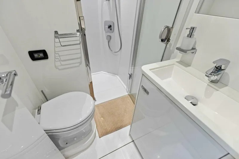 Amarula Sun Yacht Photos Pics Luxurious bathroom in 2024 Princess X80 yacht, featuring modern fixtures and sleek design.