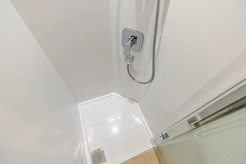 Amarula Sun Yacht Photos Pics Modern shower area in 2024 Princess X80 yacht, featuring sleek design and fixtures.