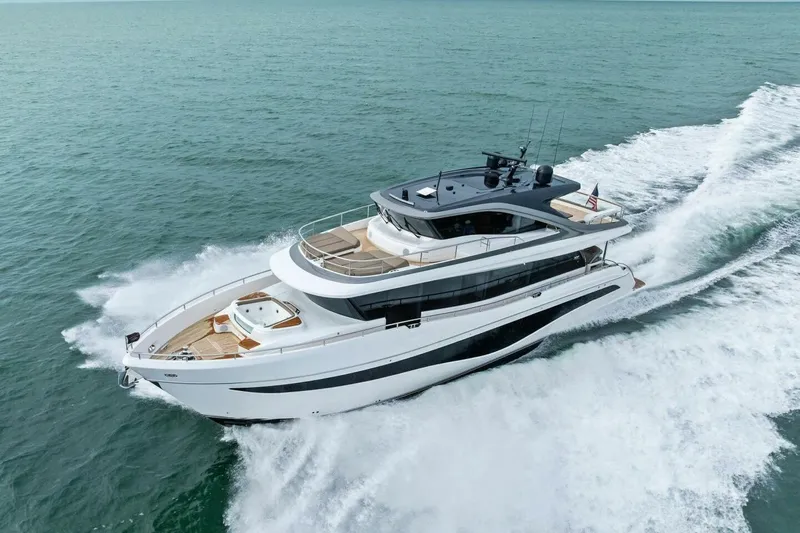 Amarula Sun Yacht Photos Pics Luxurious 2024 Princess X80 yacht cruising on open sea, showcasing sleek design and elegance.