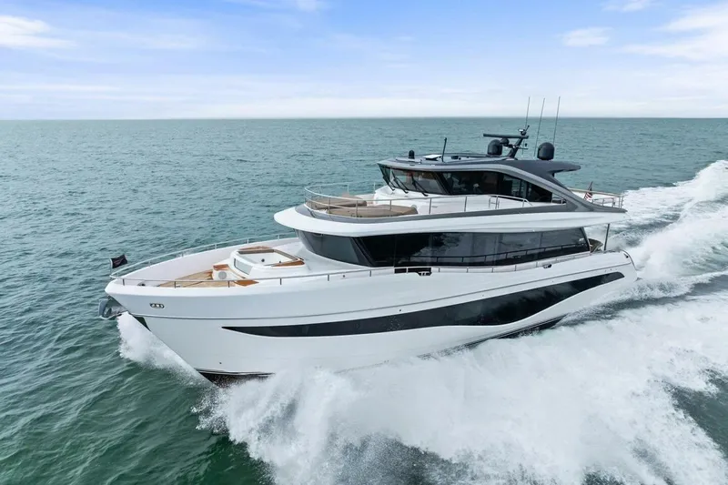 Amarula Sun Yacht Photos Pics Luxurious 2024 Princess X80 yacht cruising on open sea, showcasing sleek design and elegance.