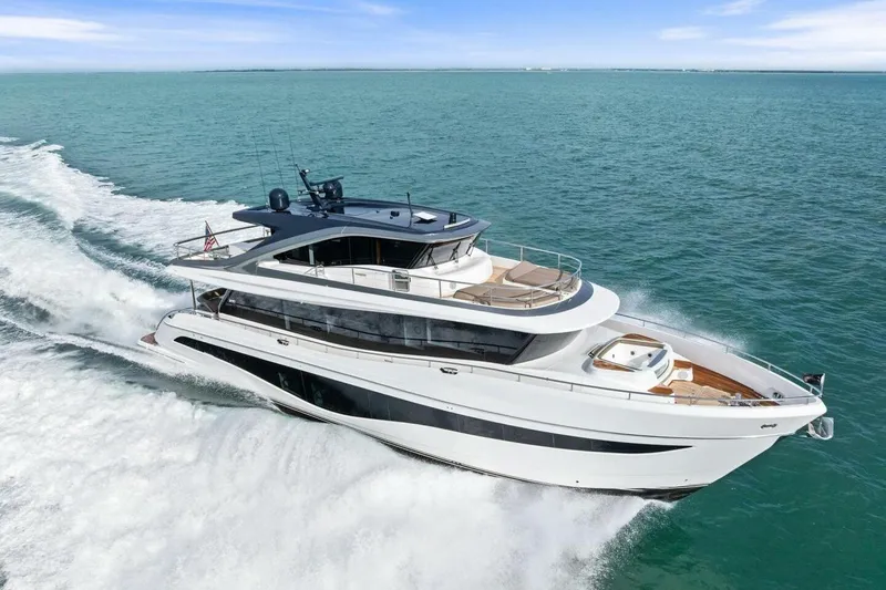 Amarula Sun Yacht Photos Pics Luxurious 2024 Princess X80 yacht cruising on open sea, showcasing sleek design and elegance.