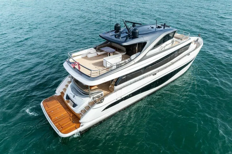 Amarula Sun Yacht Photos Pics Luxurious 2024 Princess X80 yacht cruising on open water, showcasing elegant design and spacious deck.