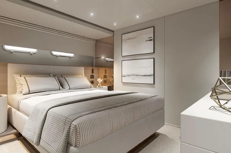  Yacht Photos Pics Luxurious bedroom interior of 2025 Sanlorenzo SL90A yacht, featuring modern decor and elegant bedding.