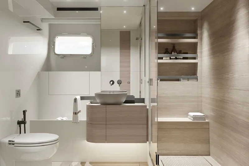  Yacht Photos Pics Luxurious bathroom interior of 2025 Sanlorenzo SL90A yacht, featuring modern design and elegant fixtures.