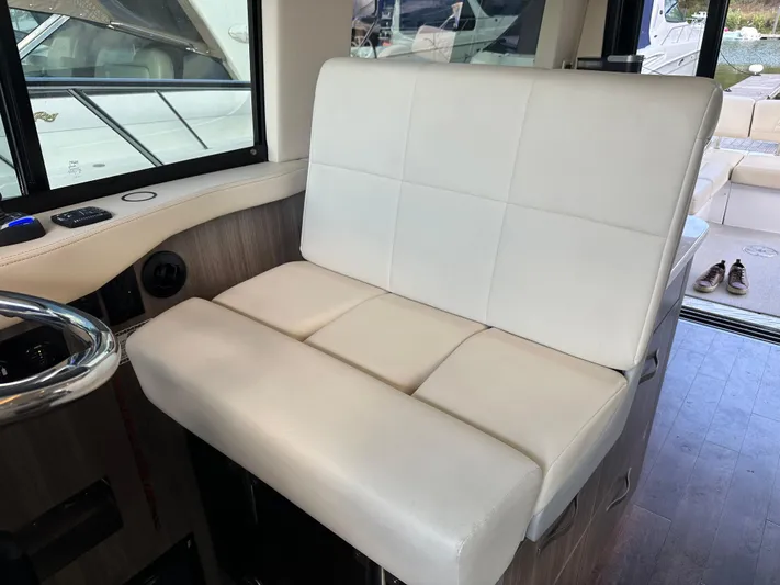 Vinovoyager Yacht Photos Pics White leather seating in 2021 Regal 42 FXO boat interior.