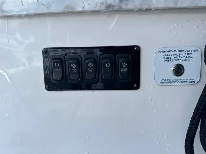 Vinovoyager Yacht Photos Pics Control panel on a 2021 Regal 42 FXO boat with outboard flushing system instructions.