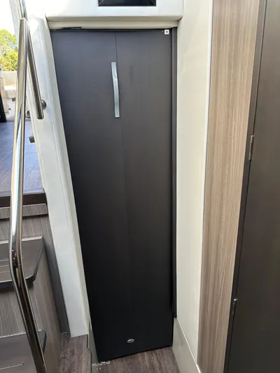 Vinovoyager Yacht Photos Pics 2021 Regal 42 FXO interior with sleek, modern cabinetry and elegant design.