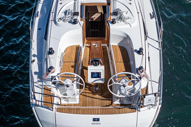 New Sailboat Yacht Photos Pics Top view of 2024 Bavaria Cruiser 34 sailboat with dual steering wheels.