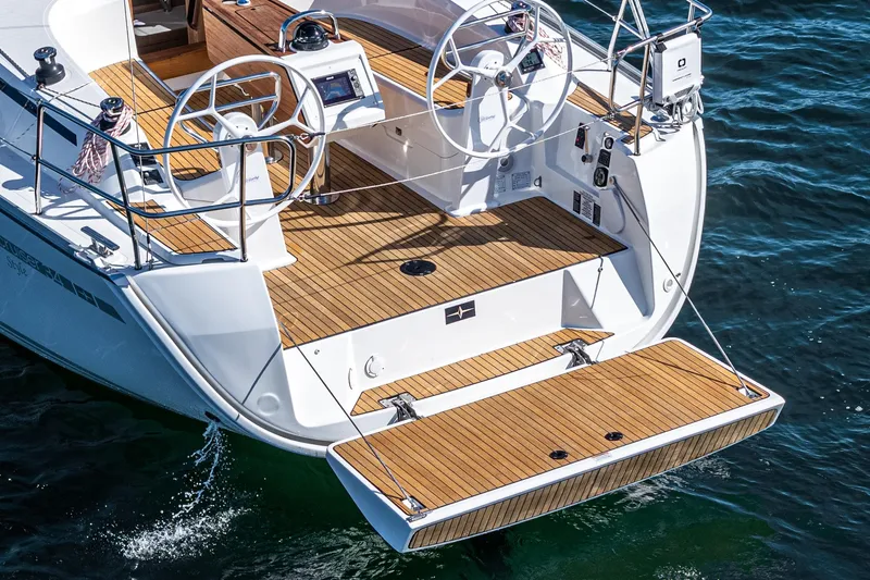 New Sailboat Yacht Photos Pics 2024 Bavaria Cruiser 34 yacht with dual steering wheels and teak deck.
