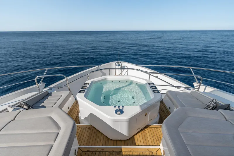 Noroader Yacht Photos Pics Luxurious Sunseeker 116 yacht deck with jacuzzi, ocean view, and sun loungers, 2020 model.