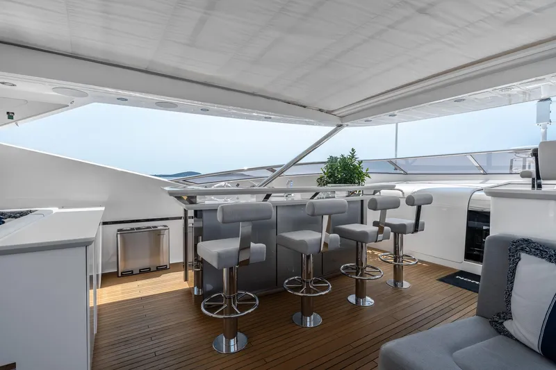 Noroader Yacht Photos Pics Luxurious Sunseeker 116 yacht interior with modern bar and seating, 2020 model.