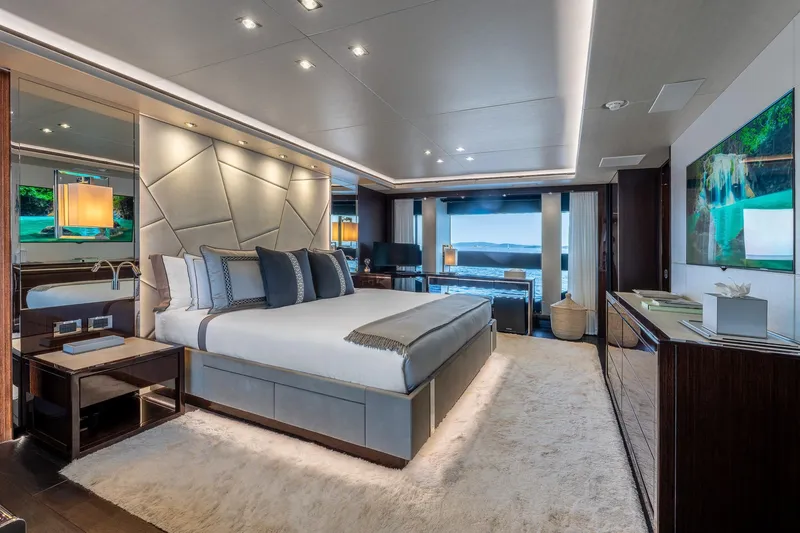 Noroader Yacht Photos Pics Luxurious Sunseeker 116 yacht bedroom interior, 2020 model, with ocean view and elegant decor.