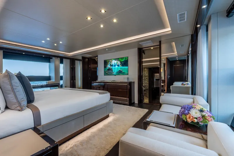 Noroader Yacht Photos Pics Luxurious Sunseeker 116 yacht bedroom interior, featuring elegant decor and ocean views.