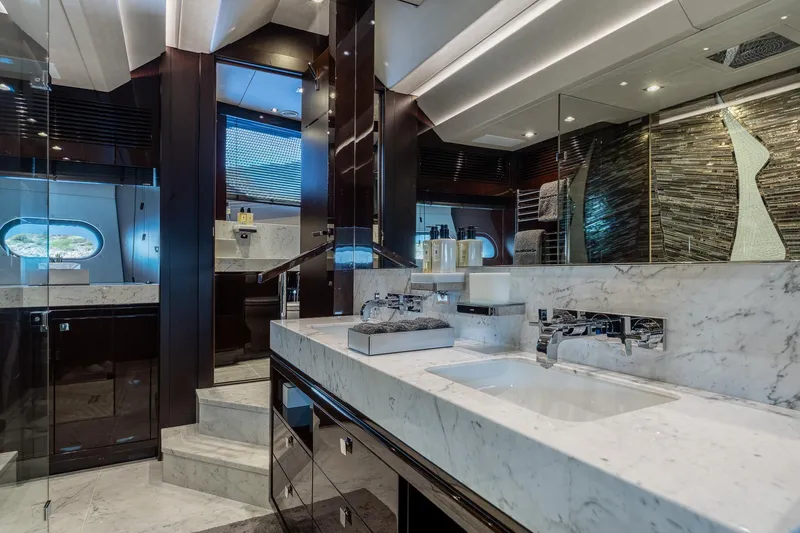 Noroader Yacht Photos Pics Luxurious Sunseeker 116 yacht bathroom with marble countertops and modern fixtures, 2020 model.
