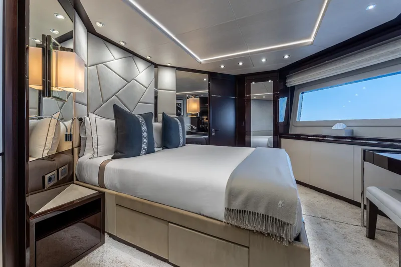 Noroader Yacht Photos Pics Luxurious bedroom interior on 2020 Sunseeker 116 yacht, featuring elegant design and modern amenities.